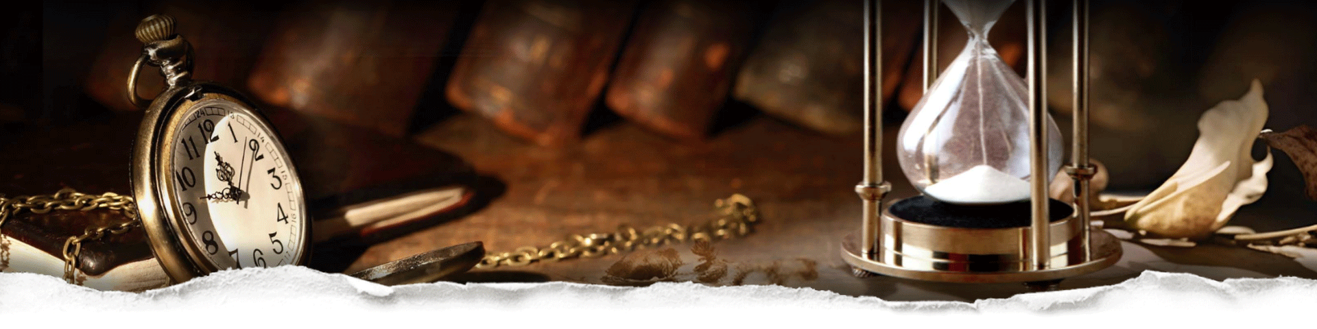 Vintage pocket watch and hourglass on a wooden surface with a hints of a dark library in the background all behind torn paper